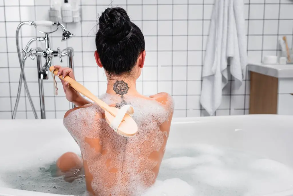 Can You Shower After Getting A New Tattoo? Tips and Advice - Tattify